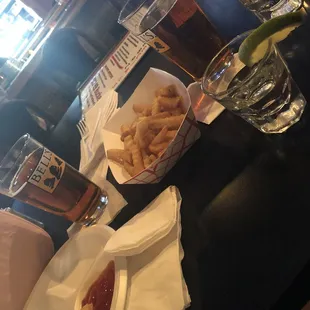 $2 beer on a sunday, $5 for any liquor and the fries