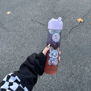 a person holding a water bottle