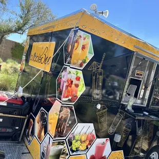 a food truck parked in a parking lot