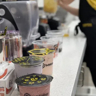 a variety of frozen yogurts on a counter