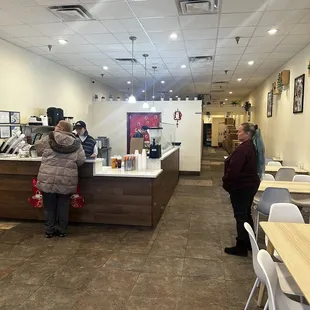customers in a restaurant waiting for their order