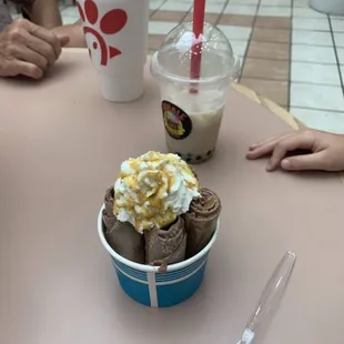 a bowl of ice cream and a cup of coffee