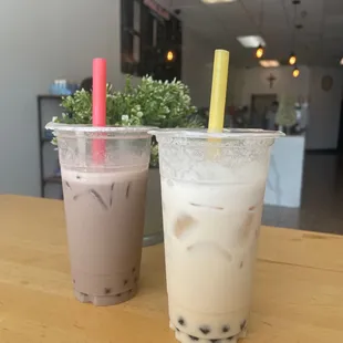 Taro milk tea with dragon fruit boba (left)  Flavor Green Milk Tea with tapioca (right)