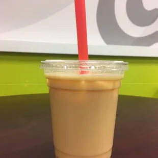 Medium mango milk tea with mango popping bubbles