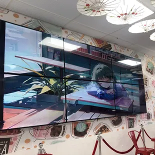 Anime mood display above seating area