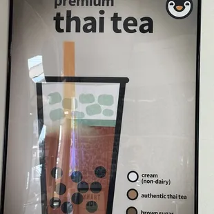 a drink in a plastic cup with a straw