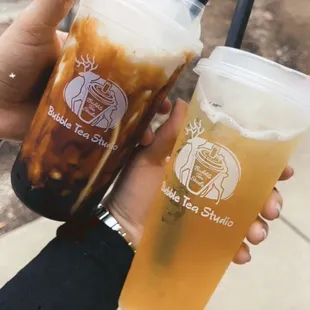 Brown sugar milk tea with brown sugar jelly 50% light ice (left); white peach tea with pop peach bubble 25% light ice (right)