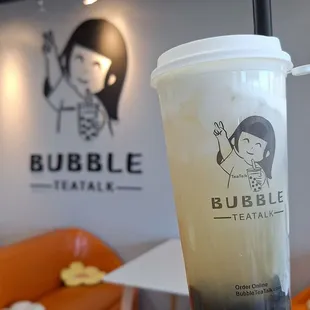 Oolong Tea with sea salt milk foam. Lightly sweetened with a tiny amount of boba.