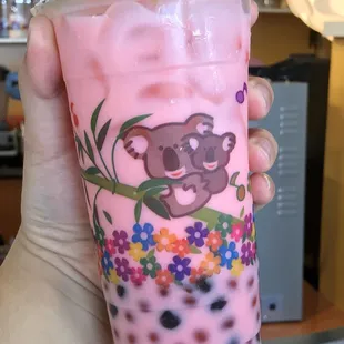 Strawberry bubble milk tea. With regular boba and strawberry popping boba