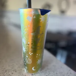Mango green tea with golden boba