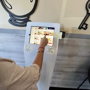 a person using a touch screen
