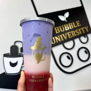Strawberry taro tea with golden boba