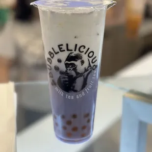 a cup of bubble tea on a table