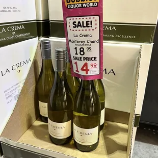 three bottles of white wine