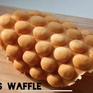 a waffle on a cutting board