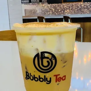 a cup of bubble tea on a table