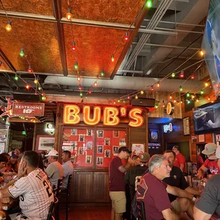 people sitting at a bar