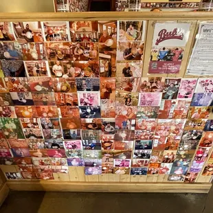 a wall covered with posters