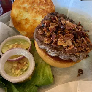 Little Settle for Less Ugly Burger with bacon. The bacon is served as bits. The burger is filling.