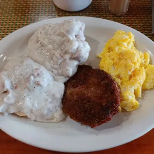 Scrambled eggs with cheese, fresh sausage Patty, homemade biscuit with Gravy- THIS is the way to start your day!