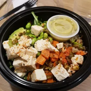 a bowl of vegetables and tofu