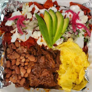 Chilaquiles con roji with barbacoa