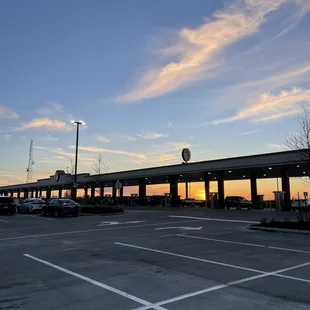 Over 100 gas pumps at sunset