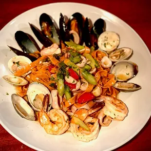 a plate of seafood pasta