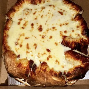 Individual pizza - burnt and overcooked on bottom