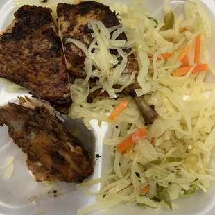 Jerk chicken with sautéed cabbage