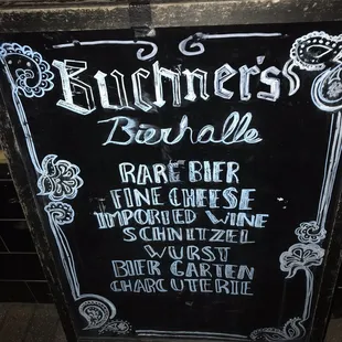 Sign on sidewalk not the building...