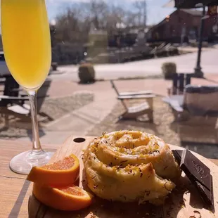 a plate of food and a glass of wine
