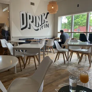 a man sitting at a table in a restaurant