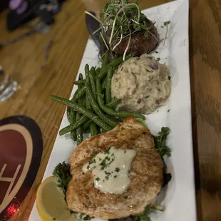 Salmon and steak, smashed potatoes and green beans