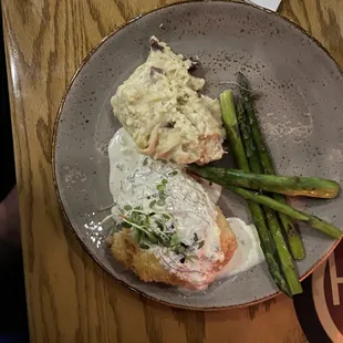 Stuffed chicken breast with garlic mashed potatoes and asparagus