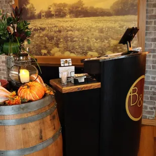 a bird sitting on a barrel