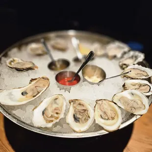 Variety of fresh (flown in daily) oysters on a half shell