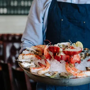 . The time-stamped cards at our raw bar will be continuously updated to reflect the freshness of our seafood .