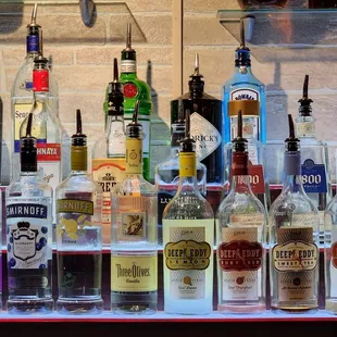 a variety of liquor bottles