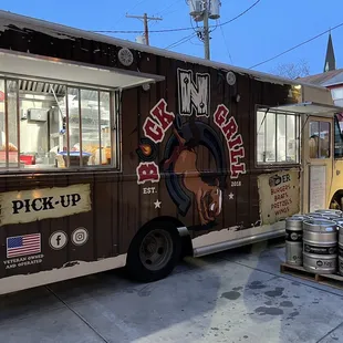 a truck with kegs on the side
