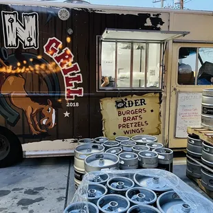 a truck with kegs on the side