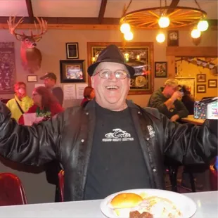 a man with his arms in the air