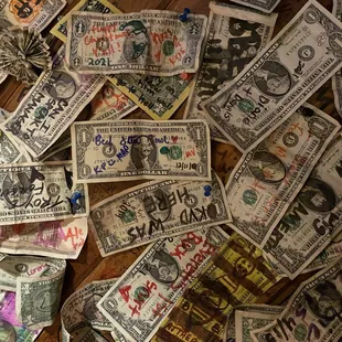a pile of money on a table