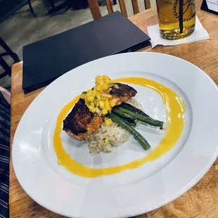 Texas Redfish with mango habernero salsa over Parmesan risotto