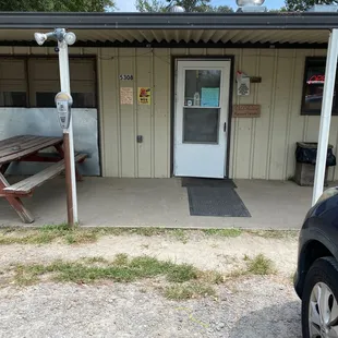 a car parked in front of the building