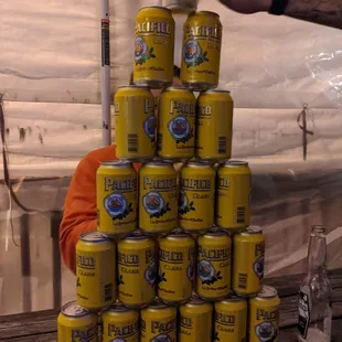 a stack of beer cans