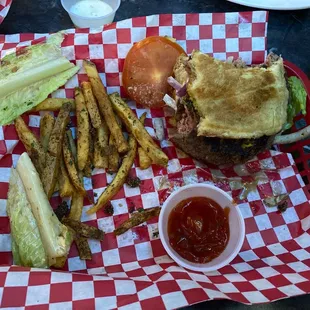 Mushroom Swiss burger with fresh cut French fries. The bun is sweet and delicious.