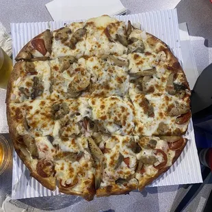 Medium pizza with extra cheese (not necessary) Mushrooms, pepperoni, and onions. Crispy and hot.