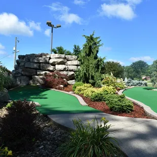 Beautiful landscape with back of waterfall in view.