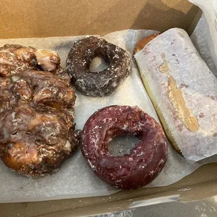 Apple fritter, devils food chocolate, red velvet, and a maple bacon bar.